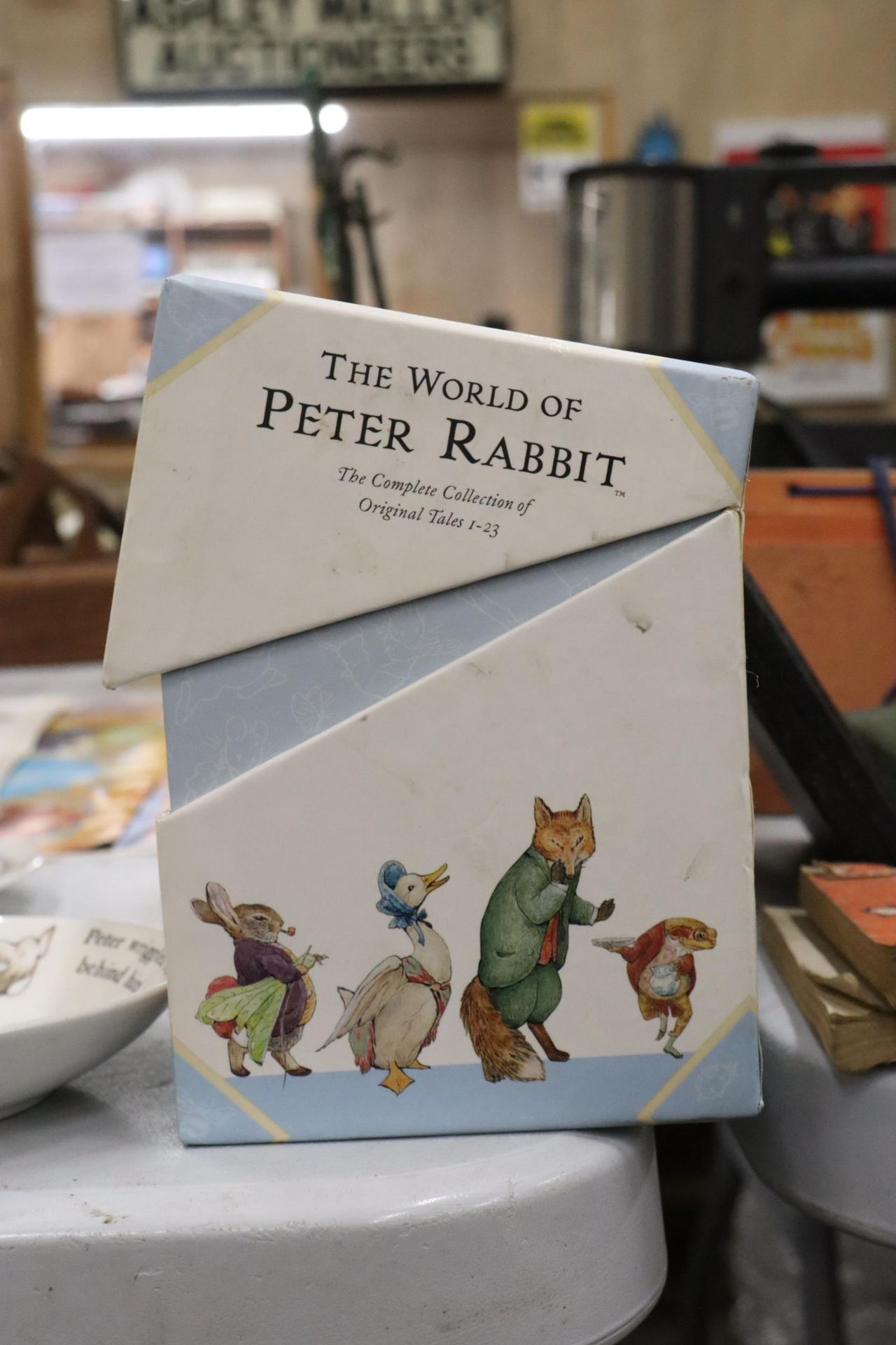 A BOXED 'THE WORLD OF PETER RABBIT' COLLECTION OF BOOKS PLUS THREE PIECES OF WEDGWOOD PETER RABBIT - Image 8 of 8