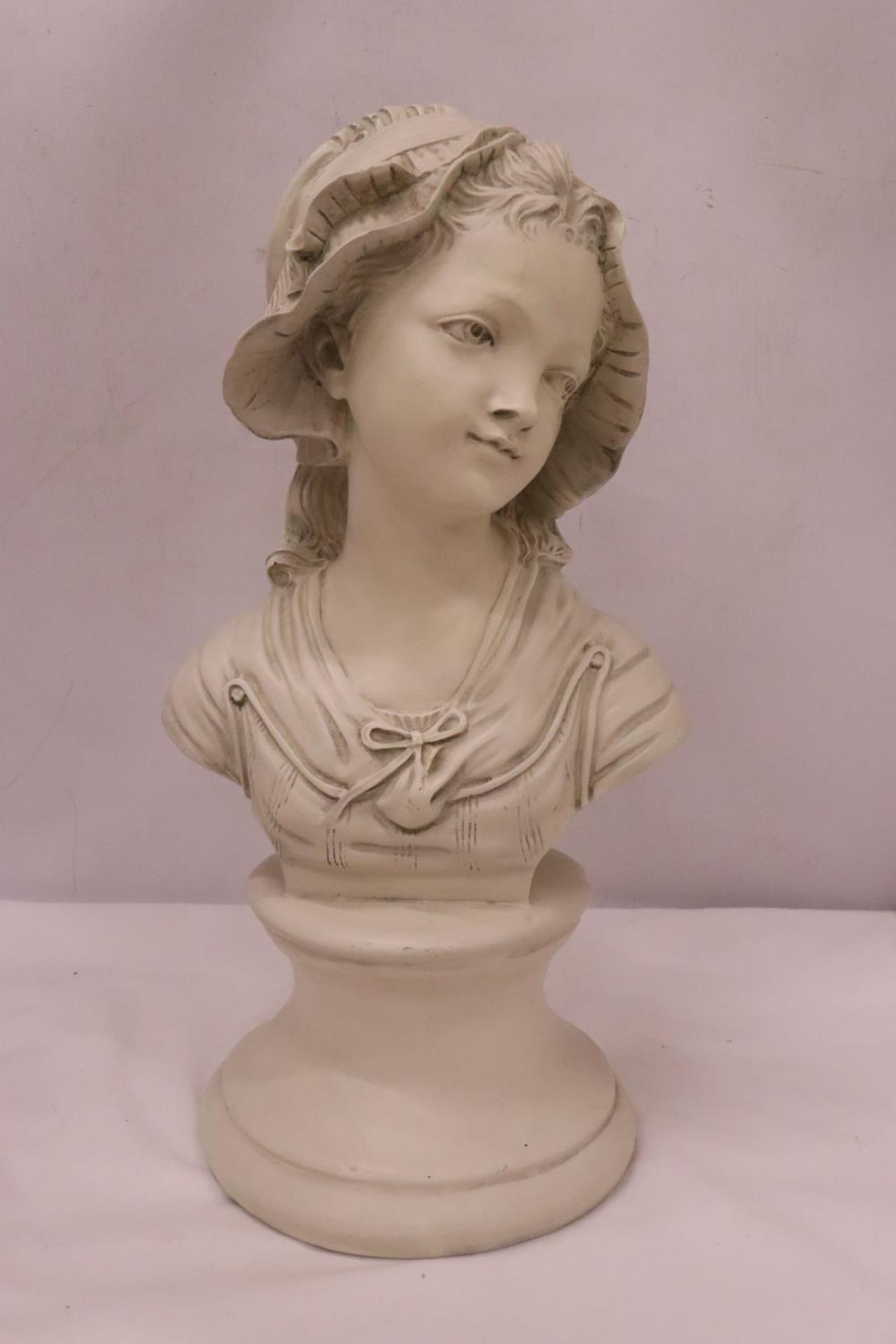 A LARGE BUST OF A LADY, HEIGHT APPR0X 42CM