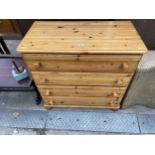 A MODERN PINE CHEST OF FOUR DRAWERS BY DUCAL, 34" WIDE