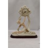 AN ART DECO STYLE MANTLE CLOCK WITH A LADY FIGURINE, HEIGHT 36CM