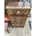 A MID 20TH CENTURY OAK CHEST OF SIX DRAWERS 24" WIDE