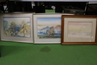 THREE FRAMED WATERCOLOURS, TWO OF COUNTRYSIDE SCENES, THE OTHER A BEACH SCENE, ALL SIGNED