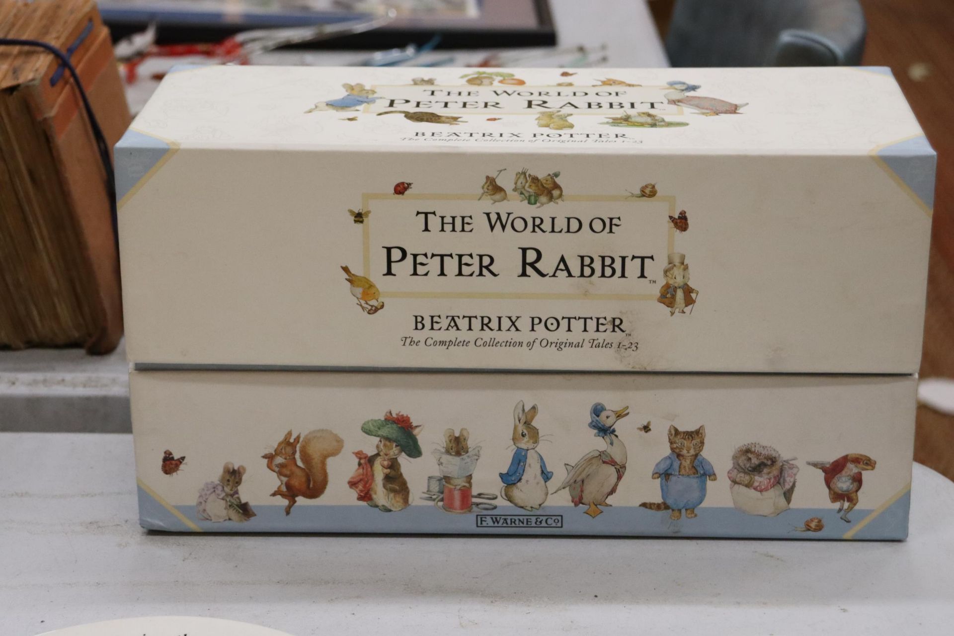 A BOXED 'THE WORLD OF PETER RABBIT' COLLECTION OF BOOKS PLUS THREE PIECES OF WEDGWOOD PETER RABBIT - Image 7 of 8