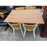 A HARDWOOD KITCHEN TABLE 47" X 31.5" AND FOUR DINING CHAIRS