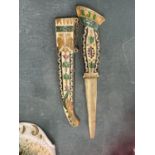AN ORNATE ENAMELLED DAGGER AND SCABBARD