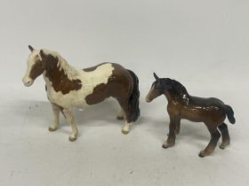 TWO BESWICK HORSES TO INCLUDE A SKEWBALD