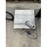 A SET OF ELECTRIC WEIGH SCALES WITH DIGITAL SCREEN