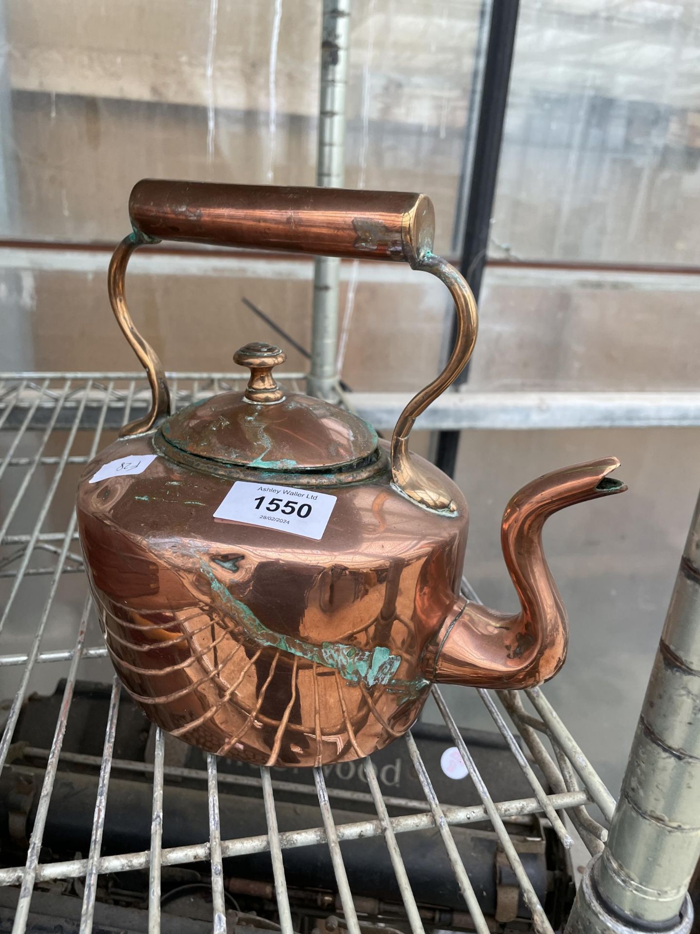 A SMALL VINTAGE COPPER KETTLE