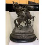 A VICTORIAN SPELTER FIGURE OF A HORSE AND RIDER ON A PLINTH