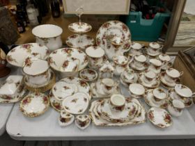 A VERY LARGE COLLECTION OF ROYAL ALBERT OLD COUNTRY ROSES TO INCLUDE TRIOS, JUGS, SUGAR BOWLS,