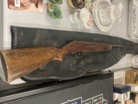 A VINTAGE AIR RIFLE WITH A T STENSBY & CO LTD MANCHESTER CASE
