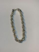 A MARKED SILVER WRIST CHAIN