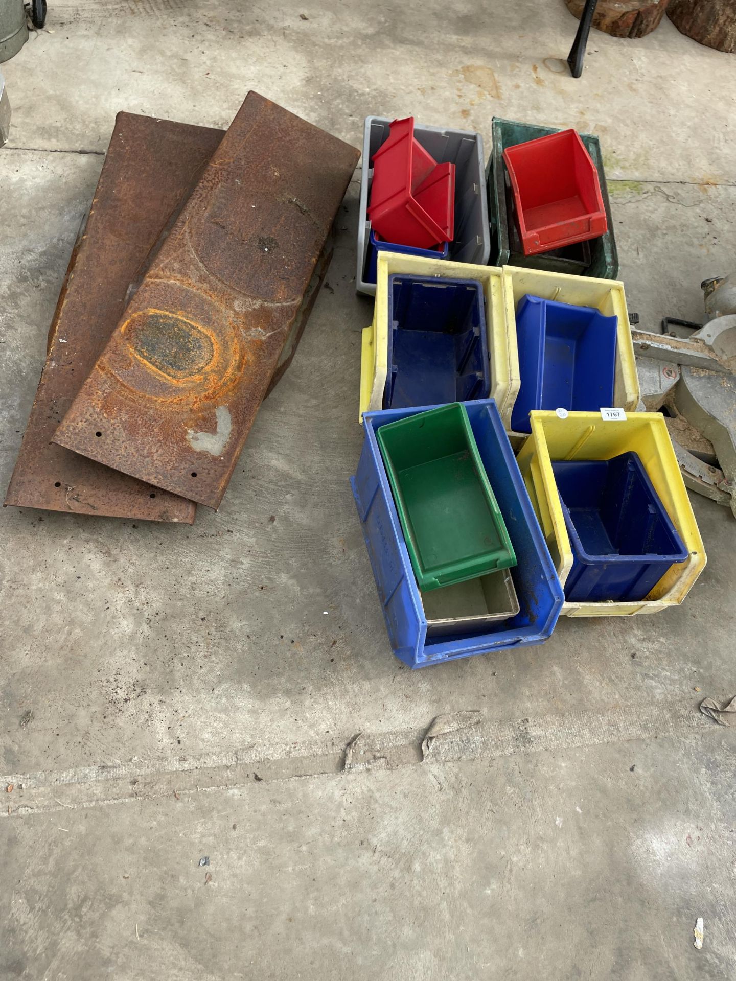 A QUANTITY OF PLASTIC LIN BINS AND A PAIR OF METAL RAMPS