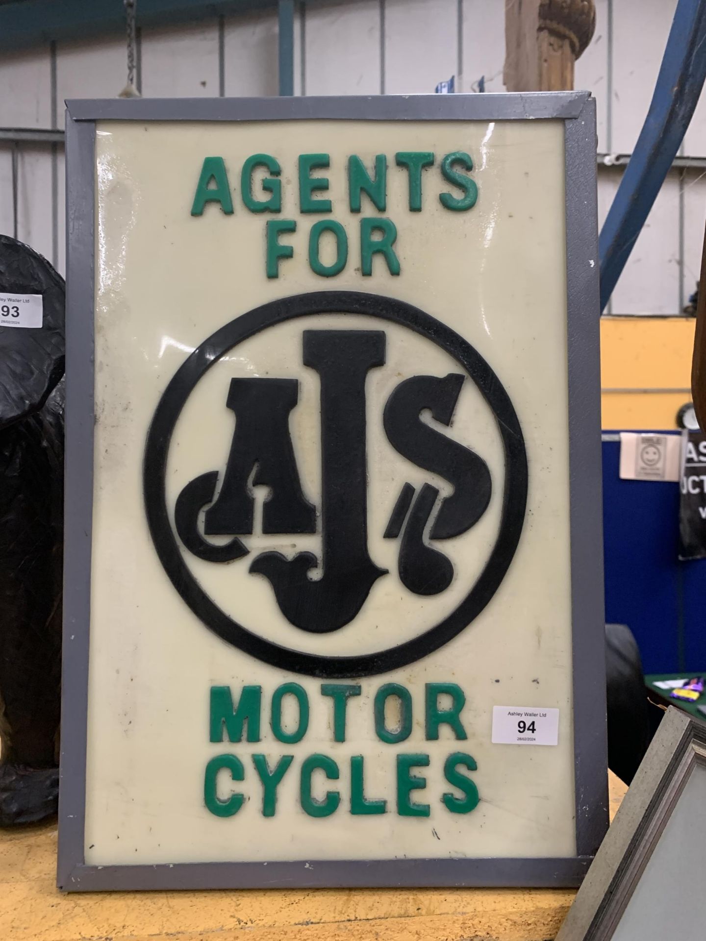 AN ILLUMINATED AGENTS FOR AJS MOTOR CYCLES SIGN