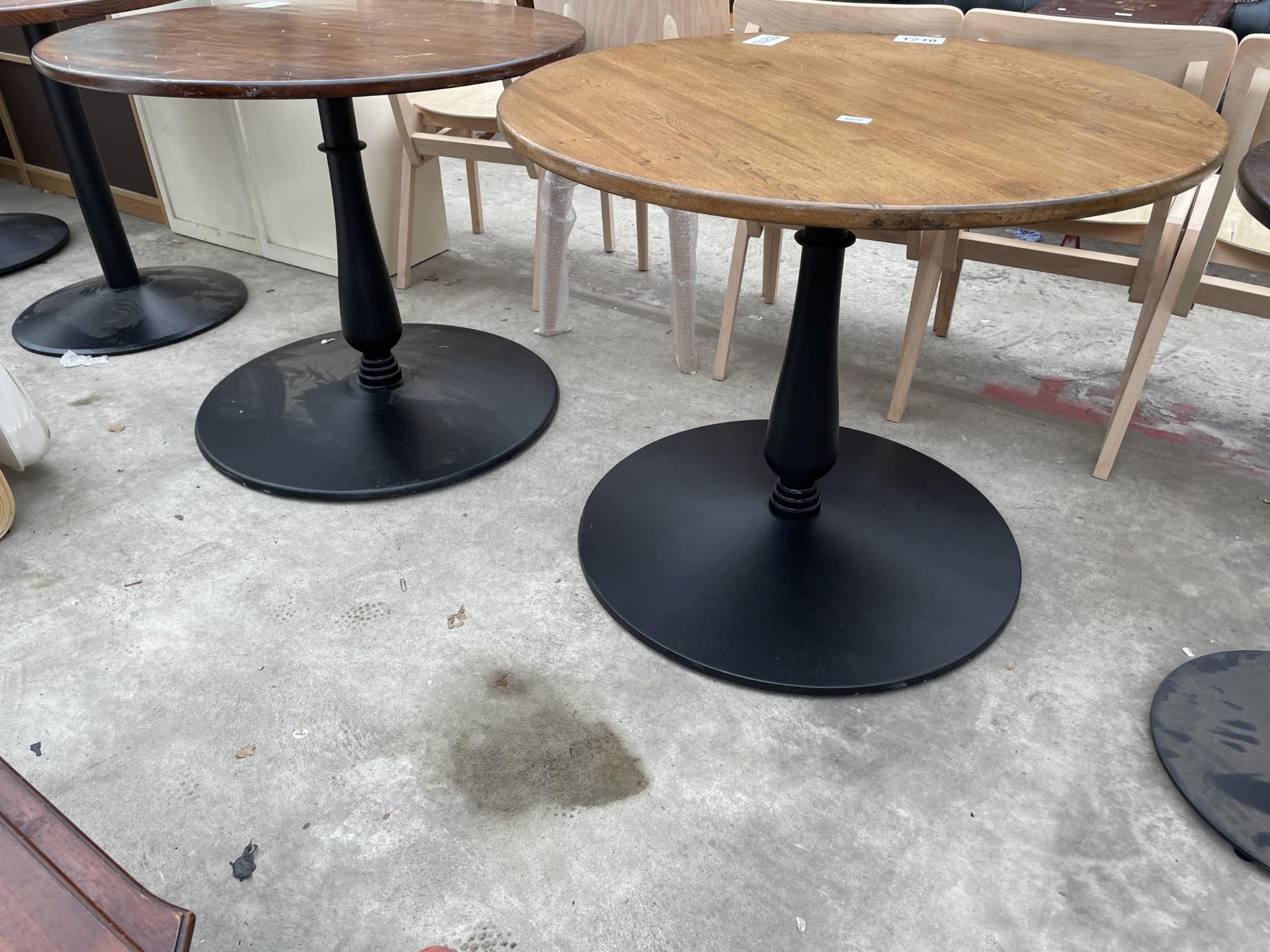 A PAIR OF PUB TABLES ON METALWARE BASES 35" DIAMETER - Image 2 of 3
