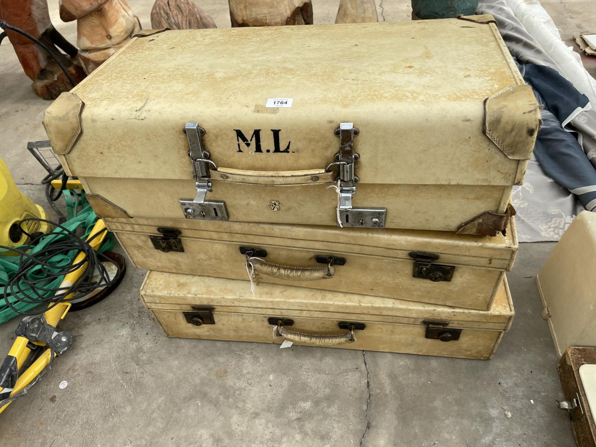 THREE VINTAGE VELLUM SUITCASES TO INCLUDE A REVELATION BEARING THE INITIALS M.L ETC