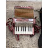 A SMALL HOHNER ACCORDIAN