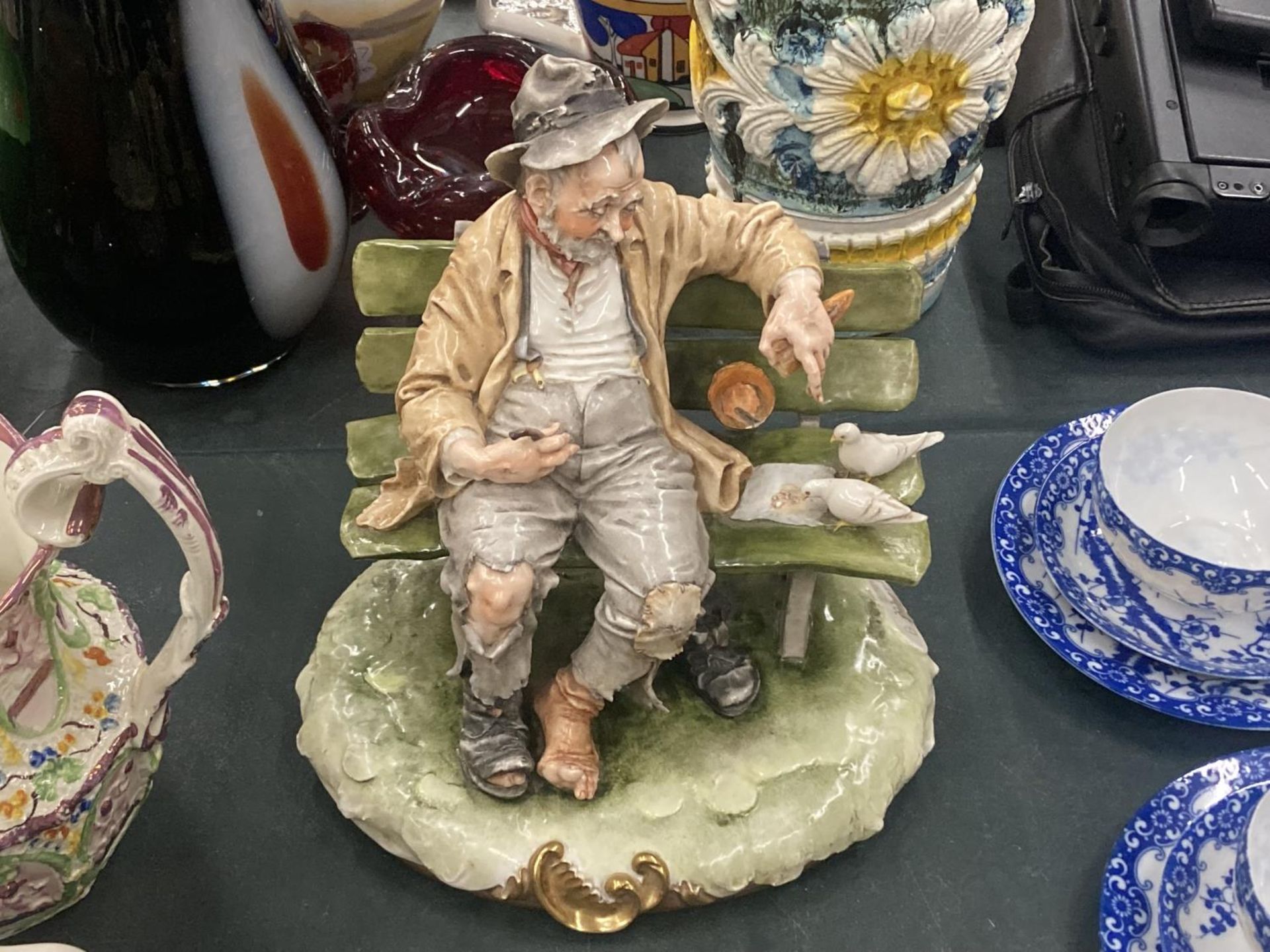 TWO ITALIAN CAPODIMONTE STYLE FIGURES TO INCLUDE AN OLD MAN ON A BENCH FEEDING BIRDS AND A BOY - Image 2 of 6