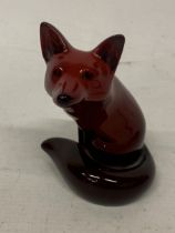 A ROYAL DOULTON FLAMBE SITTING FOX FIGURE