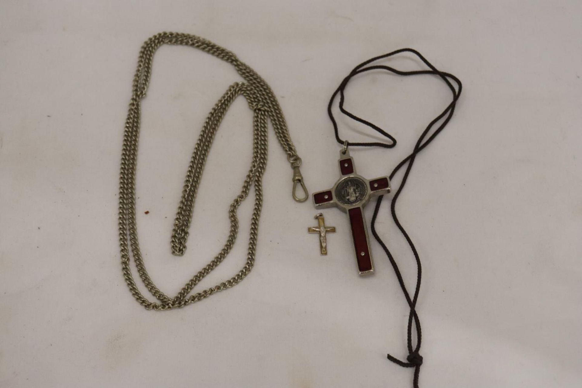 A POCKET WATCH CHAIN AND A CRUCIFIX