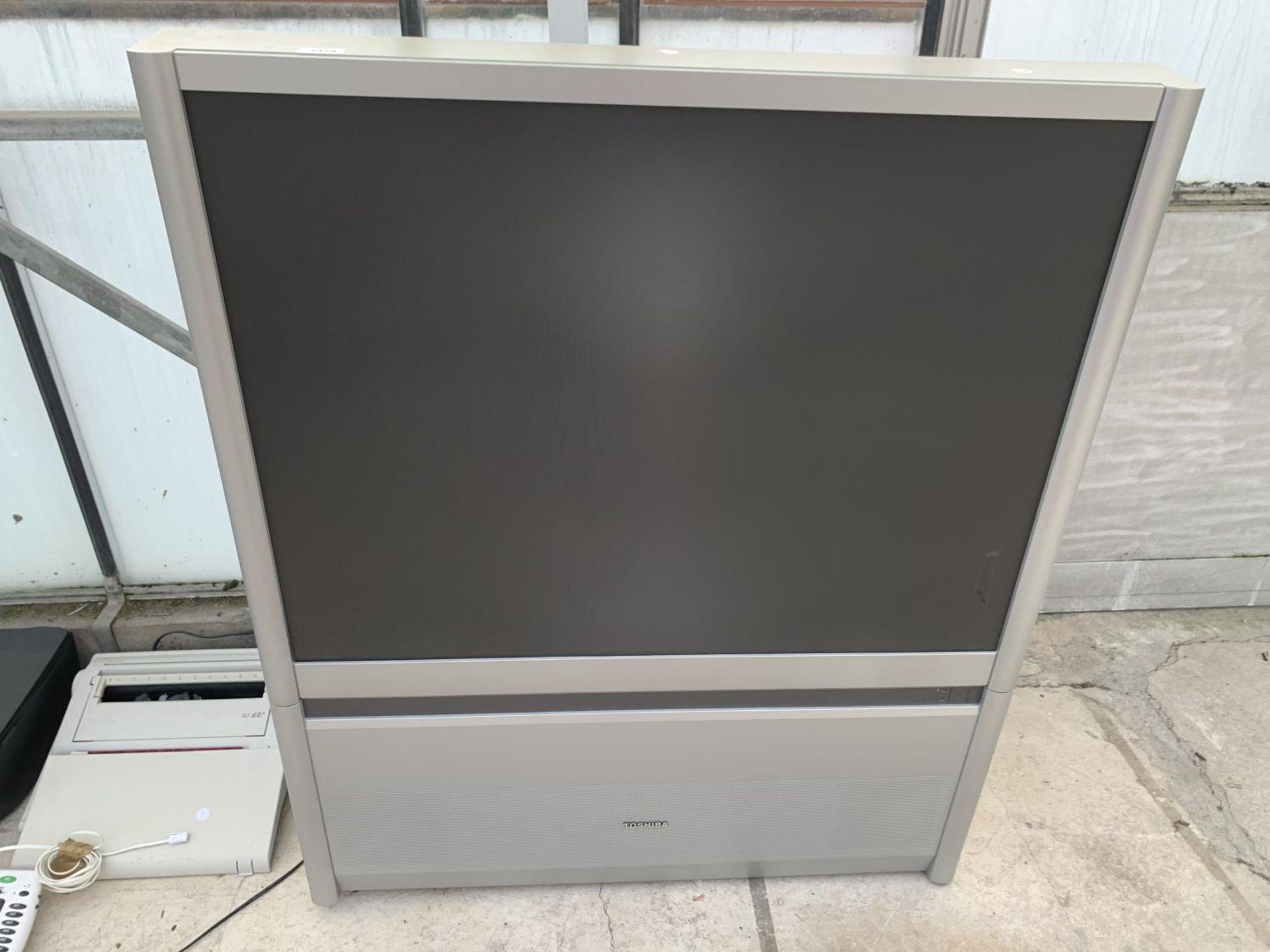 A TOSHIBA 43" TELEVISION ON STAND