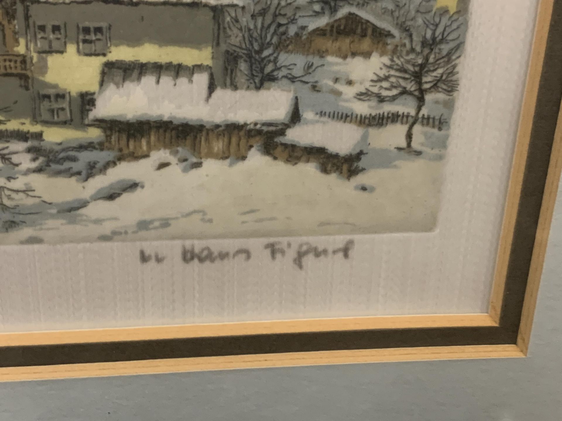 A FRAMED PRINT OF A SNOWY VILLAGE BY HANS FIGURA - Image 3 of 4