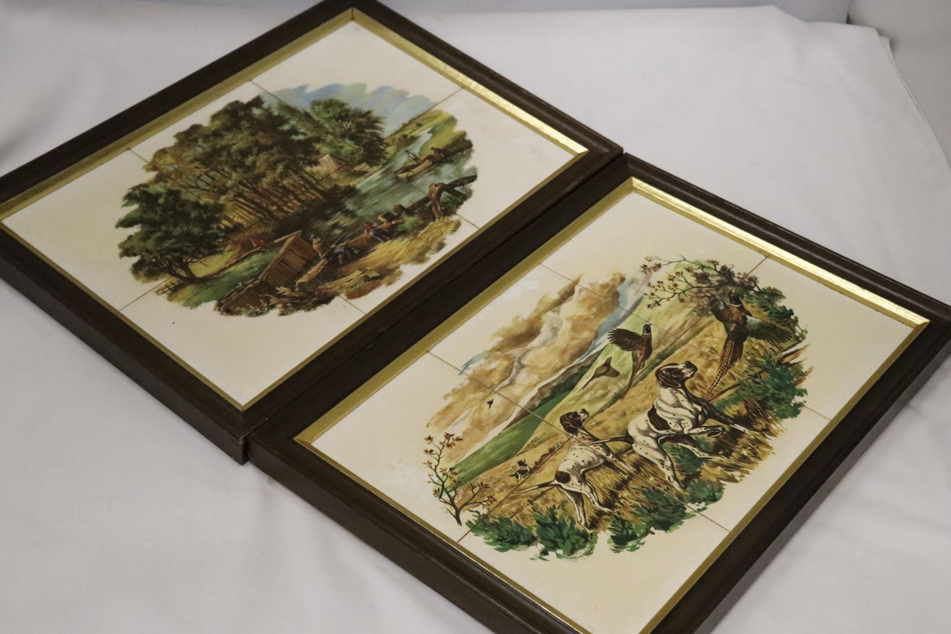 TWO FRAMED SETS OF SIX TILES DEPICTING HUNTING SCENES