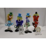 FOUR MURANO STYLE GLASS CLOWNS, A TRINKET POT AND A MINIATURE GLASS MANTLE CLOCK