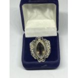 A SILVER DRESS RING WITH A SMOKEY STONE SIZE P/Q IN A PRESENTATION BOX