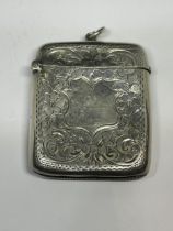 A HALLMARKED BIRMINGHAM SILVER VESTA CASE