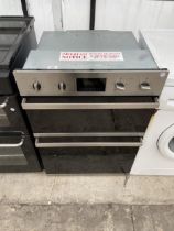 A CHROME AND BLACK BAUMATIC INTERGRATED DOUBLE OVEN