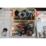 A QUANTITY OF COSTUME JEWELLERY TO INCLUDE NECKLACES, EARRINGS, BANGLES, ETC