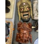 TWO WOODEN WALL MASKS