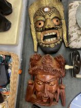 TWO WOODEN WALL MASKS