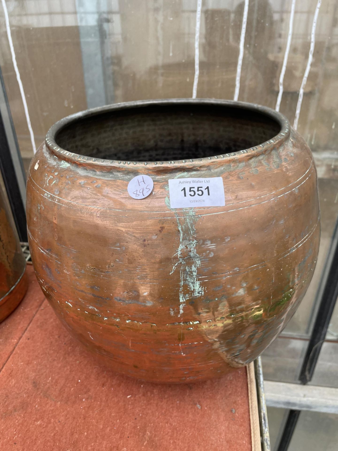 A VINTAGE AND DECORATIVE COPPER PLANTER