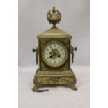 A FRENCH GILT BRASS MANTLE CLOCK WITH KEY