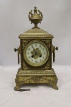 A FRENCH GILT BRASS MANTLE CLOCK WITH KEY
