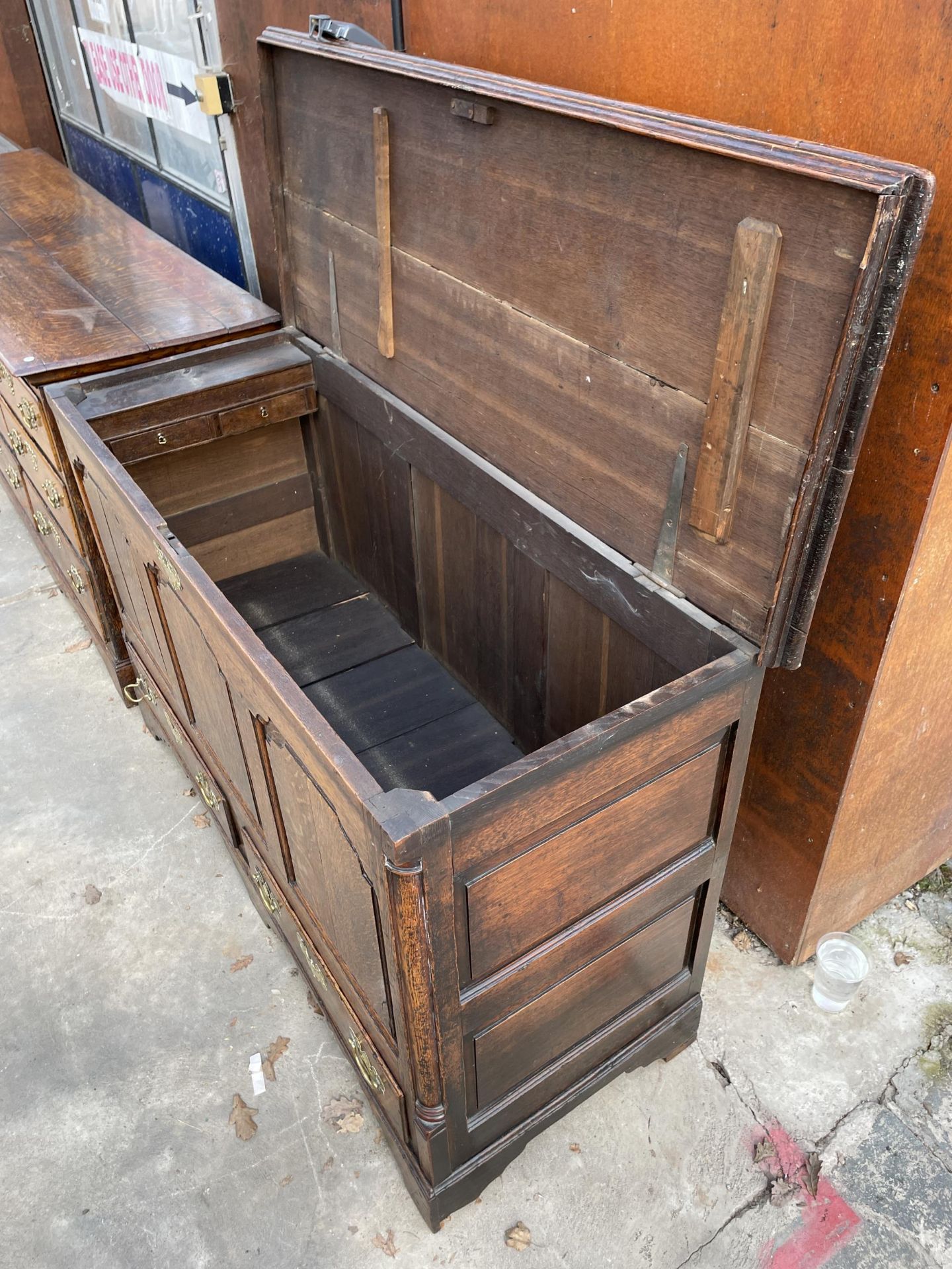 A GEORGE III OAK LANCASHIRE CHEST WITH A THREE PANEL FRONT AND TWO DRAWERS TO BASE ON BRACKET FEET - Image 4 of 6