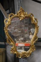 A GILT FRAMED SHIELD SHAPED MIRROR, HEIGHT 46CM