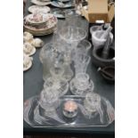 A LARGE QUANTITY OF GLASSWARE TO INCLUDE CUT GLASS VASES, BOWLS, A DRESSING TABLE SET WITH TRAY, OIL