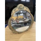 A CIRCULAR FRAMED POSSIBLY PEERART MIRROR MARKED P.J DIAMETER 43CM HEIGHT 46CM