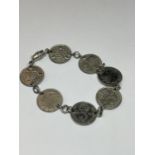 A SILVER JOEY BRACELET IN A PRESENTATION BOX