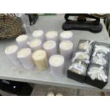 AN ASSORTMENT OF NEW CANDLES TO INCLUDE CHURCH CANDLES AND TWO SETS OF THREE SCENTED CANDLES ETC