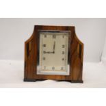 A DECO STYLE OAK 8 DAY MANTLE CLOCK WITH WIND UP MECHANISM SEEN WORKING BUT NO WARRANTY