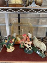 AN ASSORTMENT OF ITEMS TO INCLUDE A BIRD CAGE AND FOUR CAST IRON DOOR STOPS