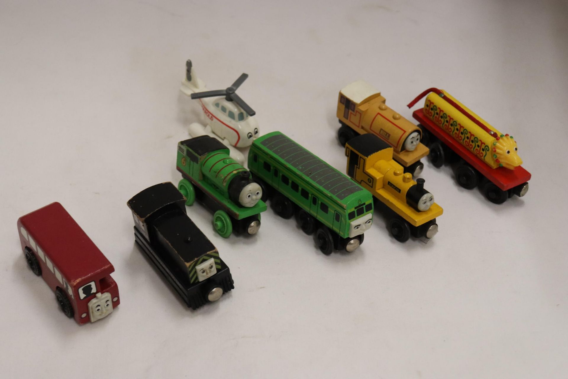 EIGHT VINTAGE WOODEN THOMAS THE TANK ENGINE TRAINS TO INCLUDE MAVIS, BILL, DUNCAN, PERCY, DAISY,