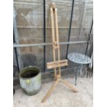 A LARGE WOODEN 'WINSOR & NEWTON' ARTISTS EASEL