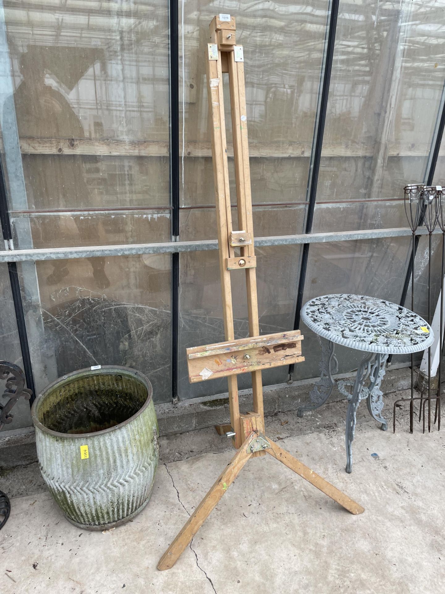 A LARGE WOODEN 'WINSOR & NEWTON' ARTISTS EASEL