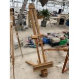 A WOODEN FOLDING ARTISTS EASEL