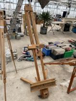 A WOODEN FOLDING ARTISTS EASEL